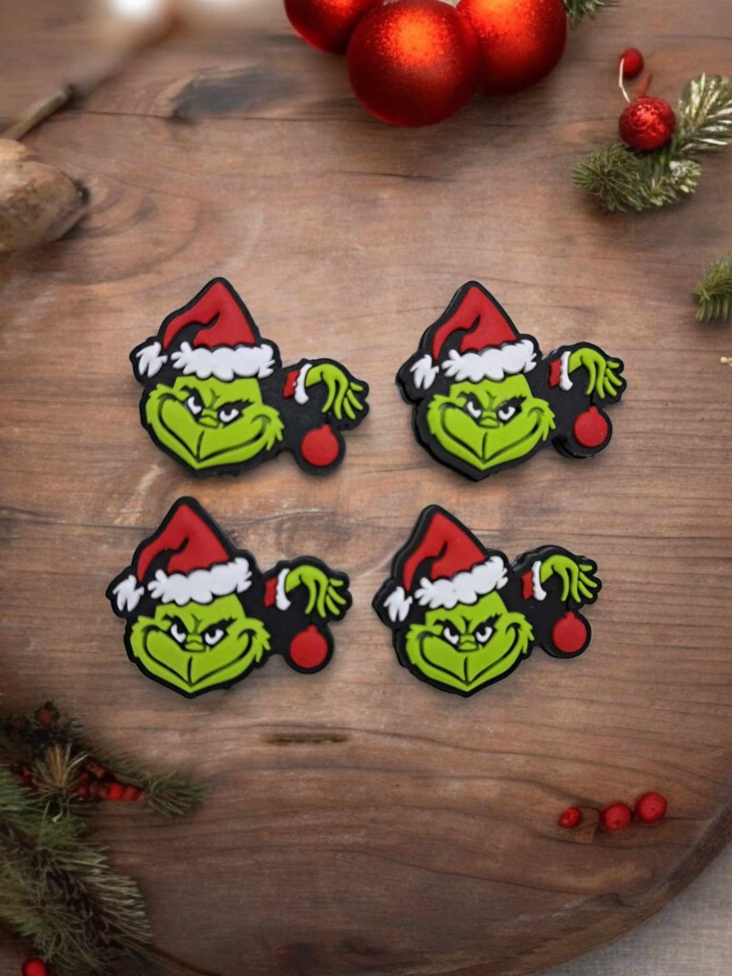 Grinch/Mean One Face and Hand holding Christmas Ornament in Santa Suit Silicone Focal Bead - 0951