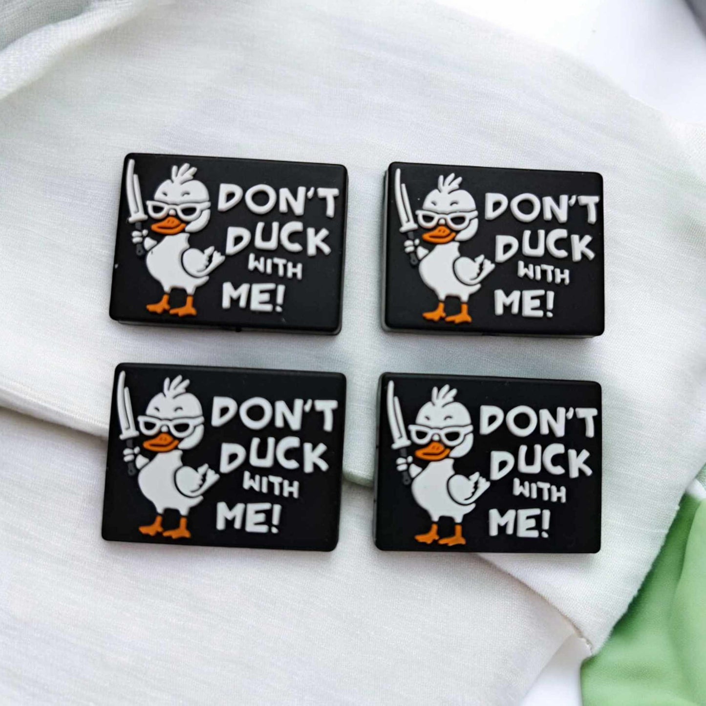 Don't Duck With Me: White Duck With Knife Black Rectangle Silicone Focal Bead