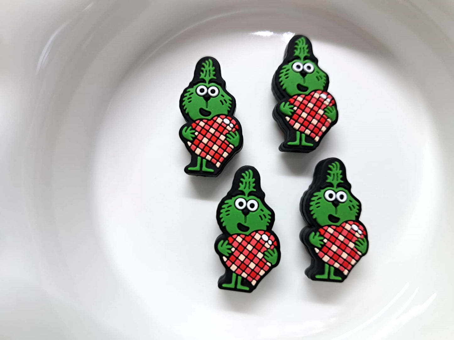 Grinch Holding Red/White Checkered Heart Silicone Focal Bead