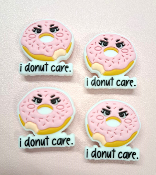 I Donut Care: Pink Donut with Face Silicone Focal Bead