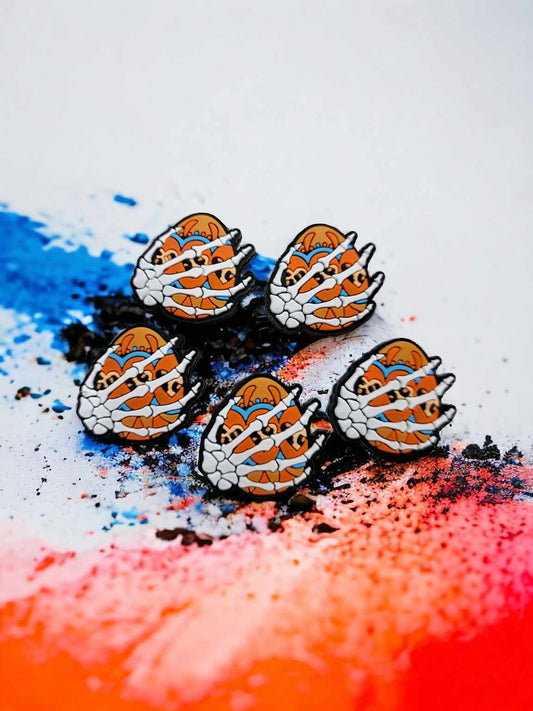 Skellie Hand holding Orange/Leopard Print Easter Egg Silicone Focal Bead - 0686